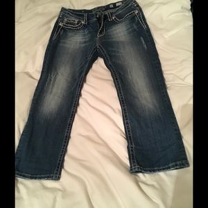 Size 30 Miss Me Jeans with rhinestones on pocket.