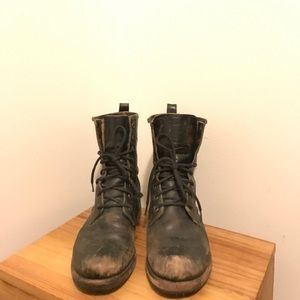 Distressed black frye combat boots