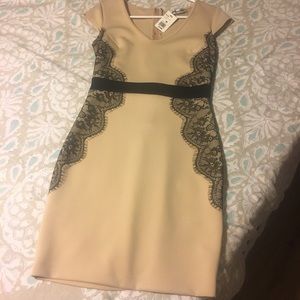 ♠️Nude dress with lace trimming.