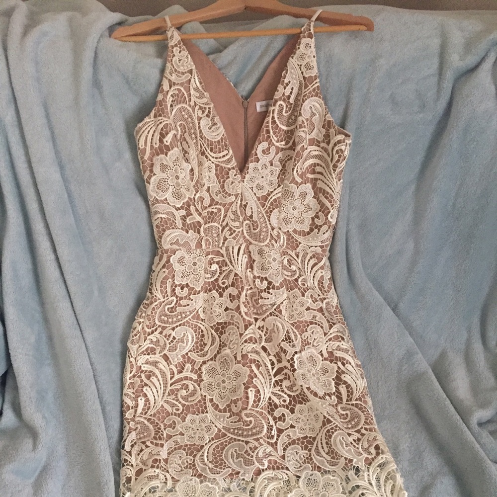 Mid length lace ivory dress