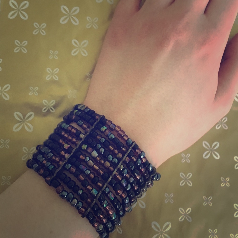 Dark purple multiple string bracelet