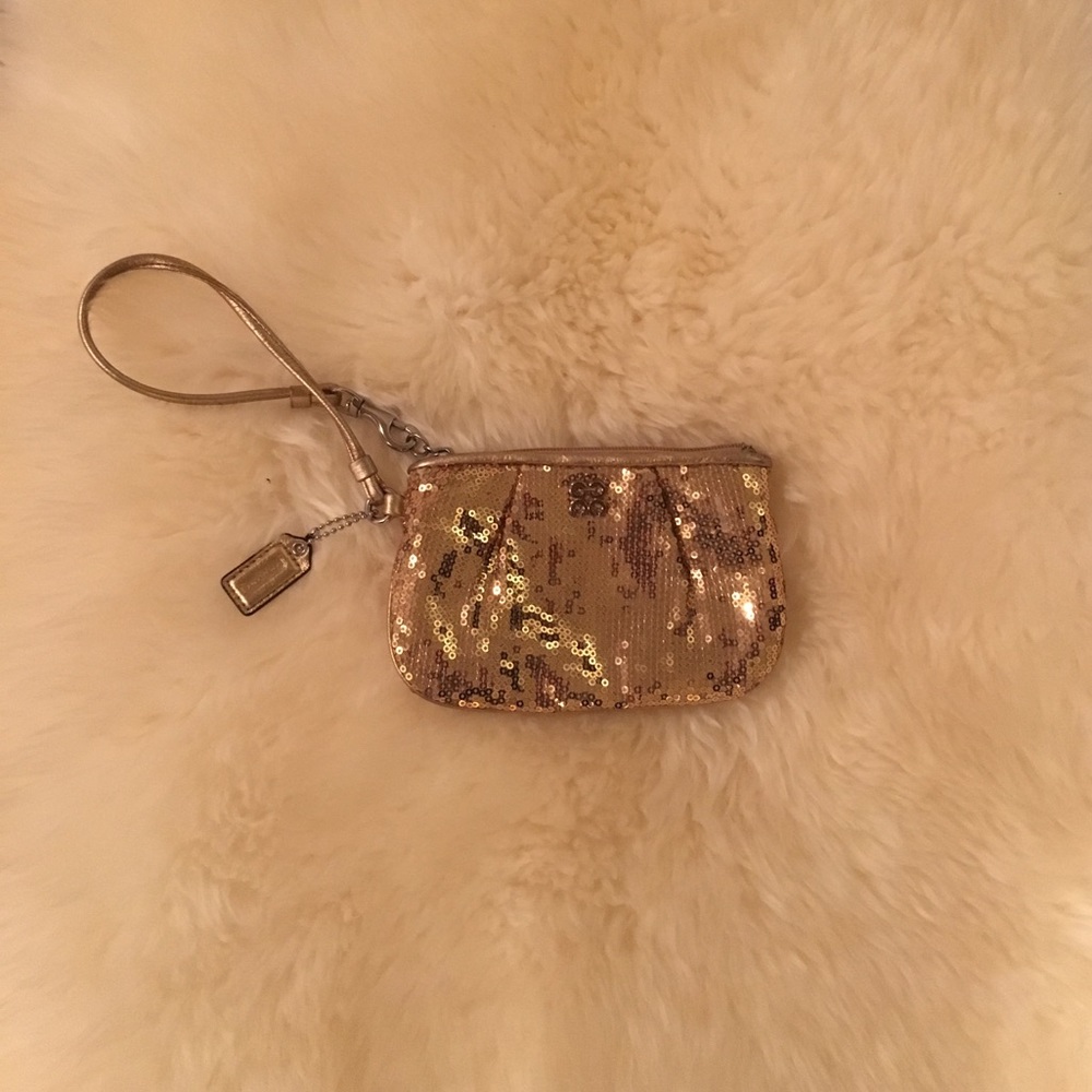 Coach gold sequin party wristlet! $10