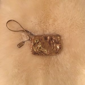 Coach gold sequin party wristlet! $10