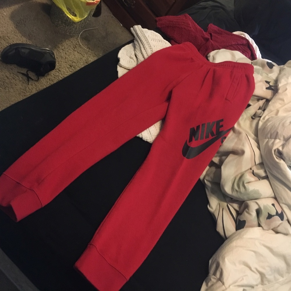 Red Nike sweats
