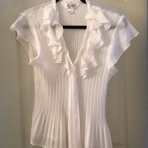 ruffled white blouse