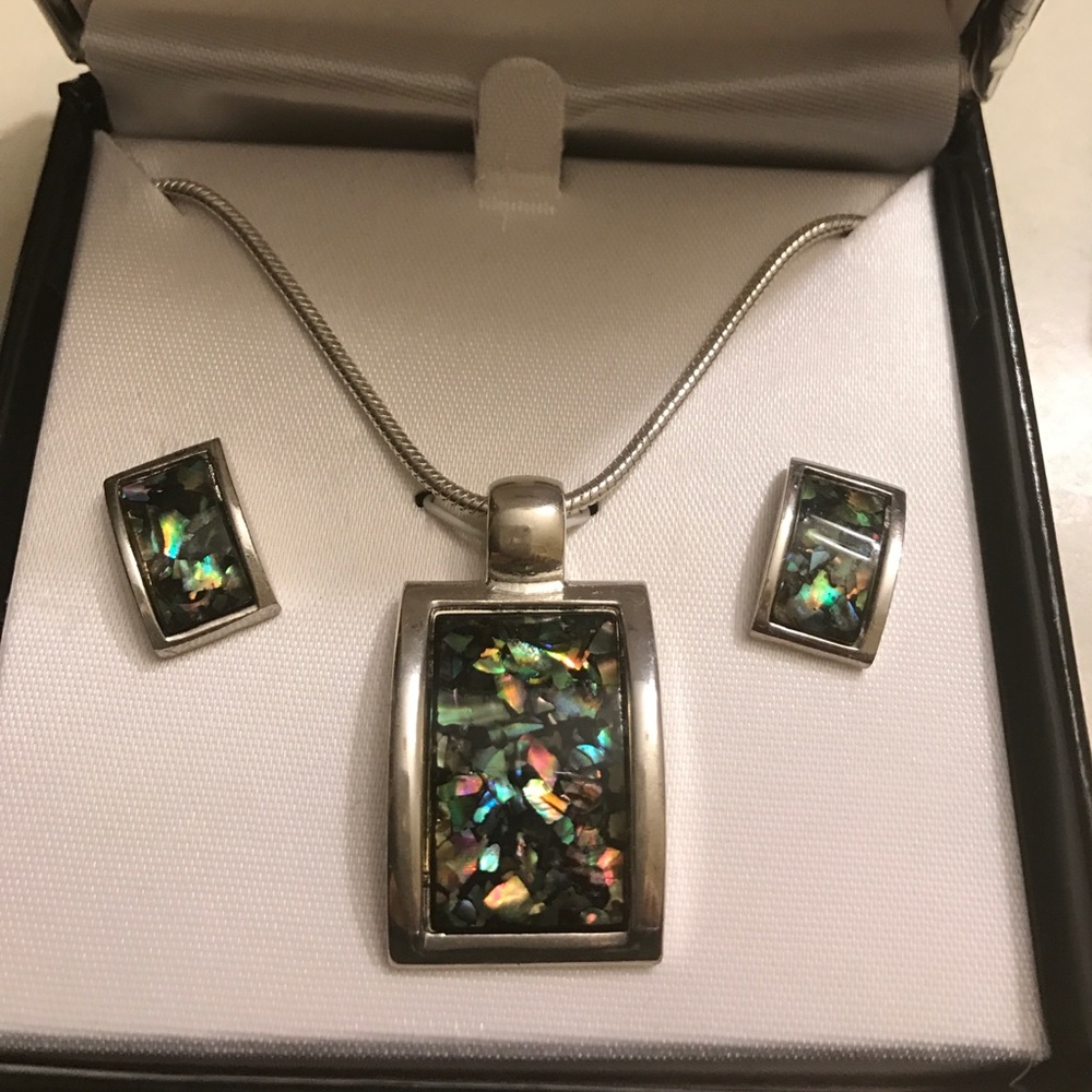 Necklace with inlaid stones.