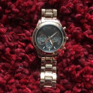 Round silver chronograph watch