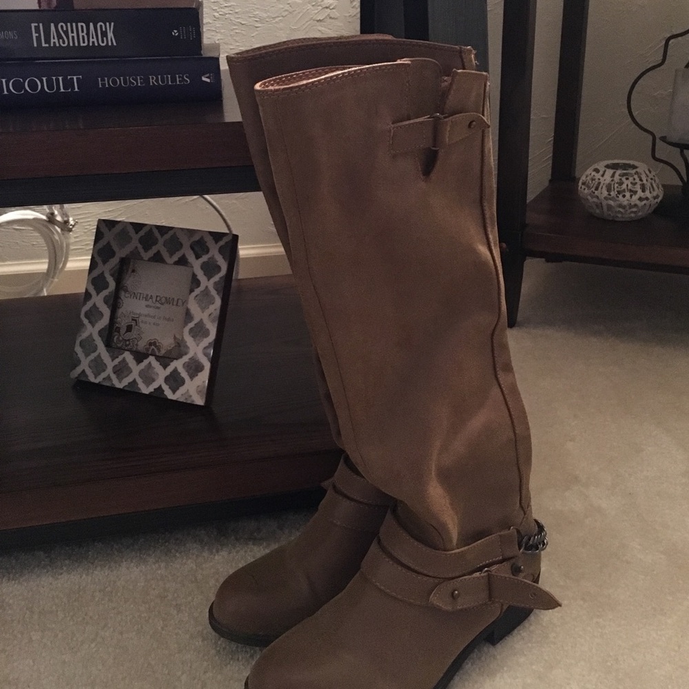Brown Riding boots.