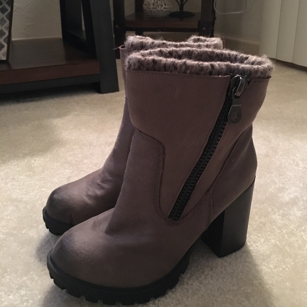 Brown distressed winter booties.