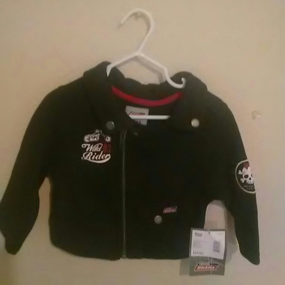 Black Dickies coat has wild rider on the front
