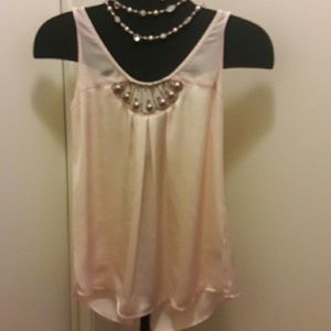 Light pink sleeveless blouse
