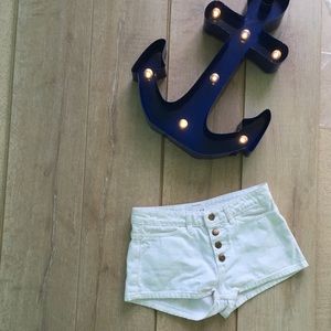 American apparel white jean shorts! Runs small