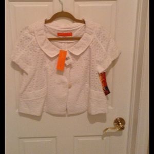 Cynthia Steffens white short sleeve jacket.