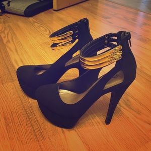 Black heels with gold ankle