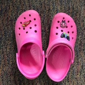 Pink crocs