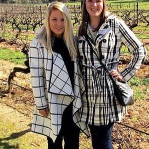 Chic black and white open coat
