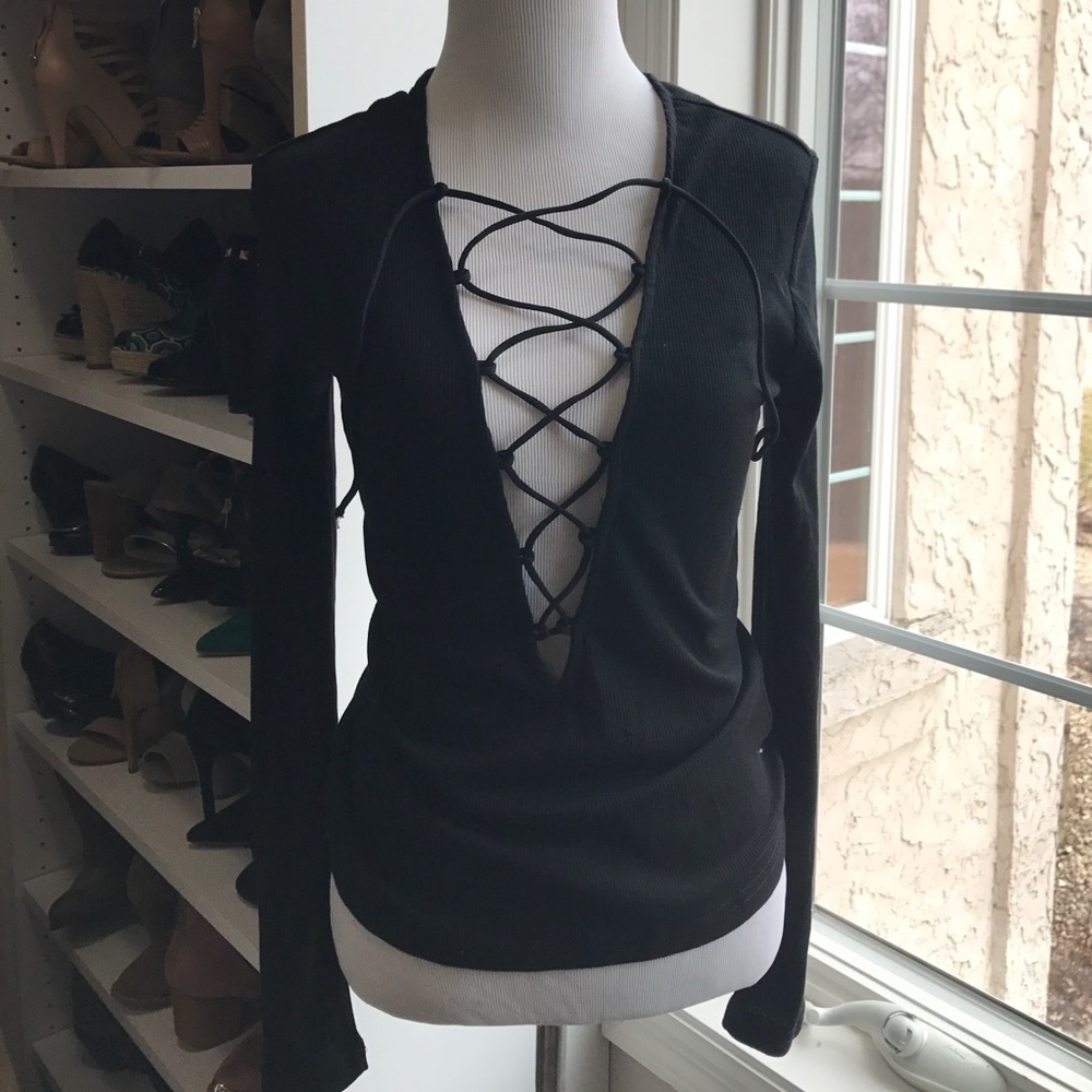 Laced up top. Sexy. Small. Like express