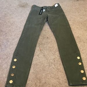 Cute olive colored jeans.