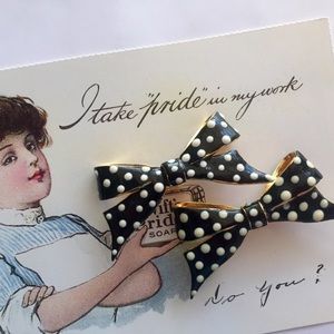 Vintage signed Kenneth Jay Lane clip-ons.