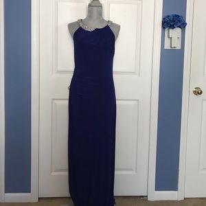 Bluefish purple gown with crystals.