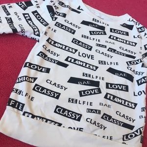 Trendy black and white sweater