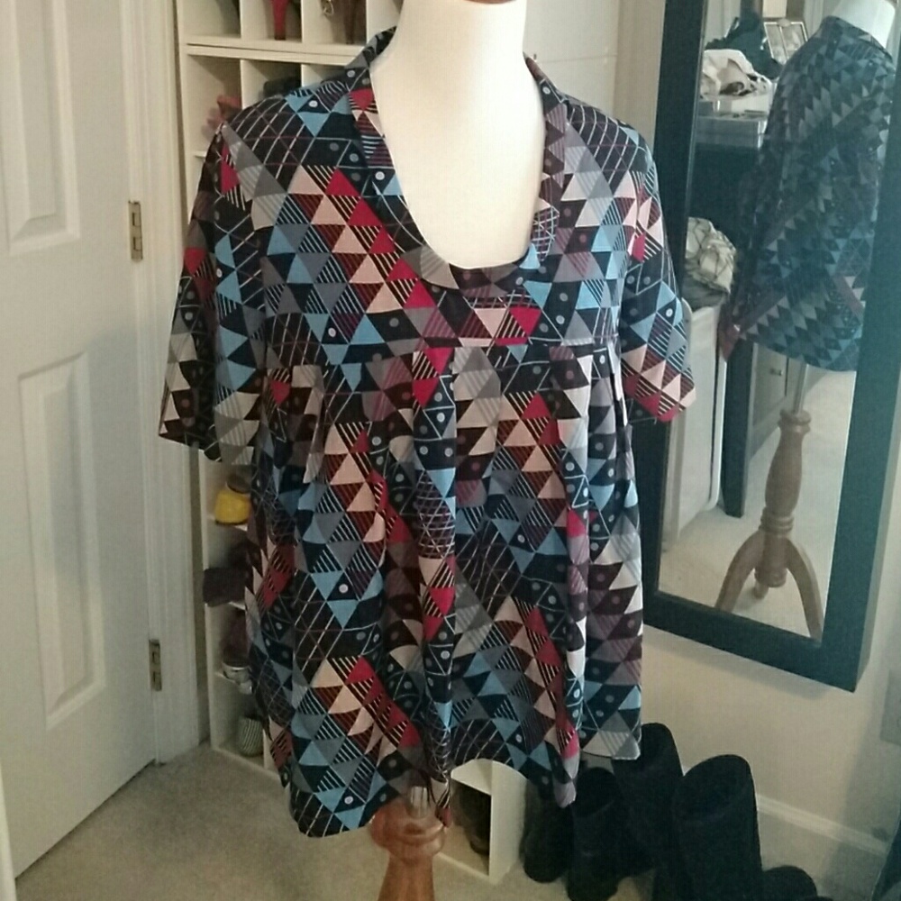 Off to ThredUP! Geometric print silk swing blouse