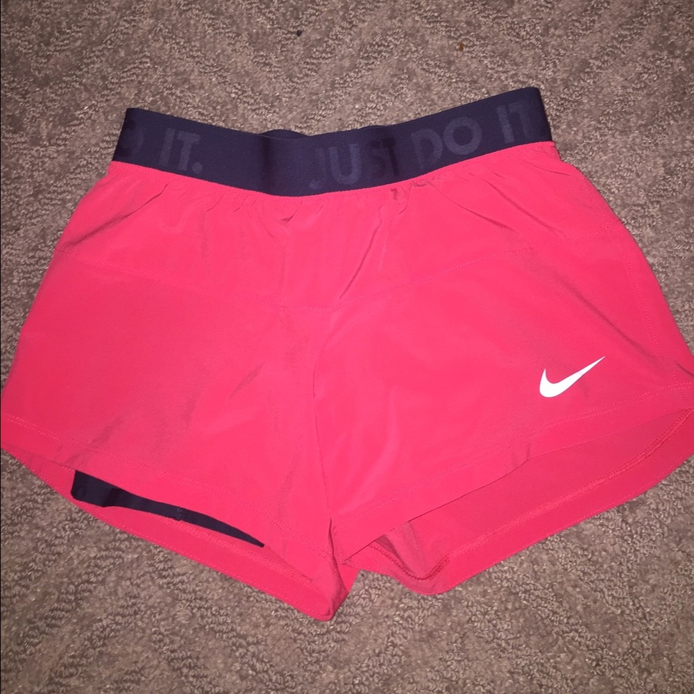 Pink and navy Nike dri fit shorts