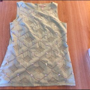 Mint colored sleeveless top with sparkle pattern