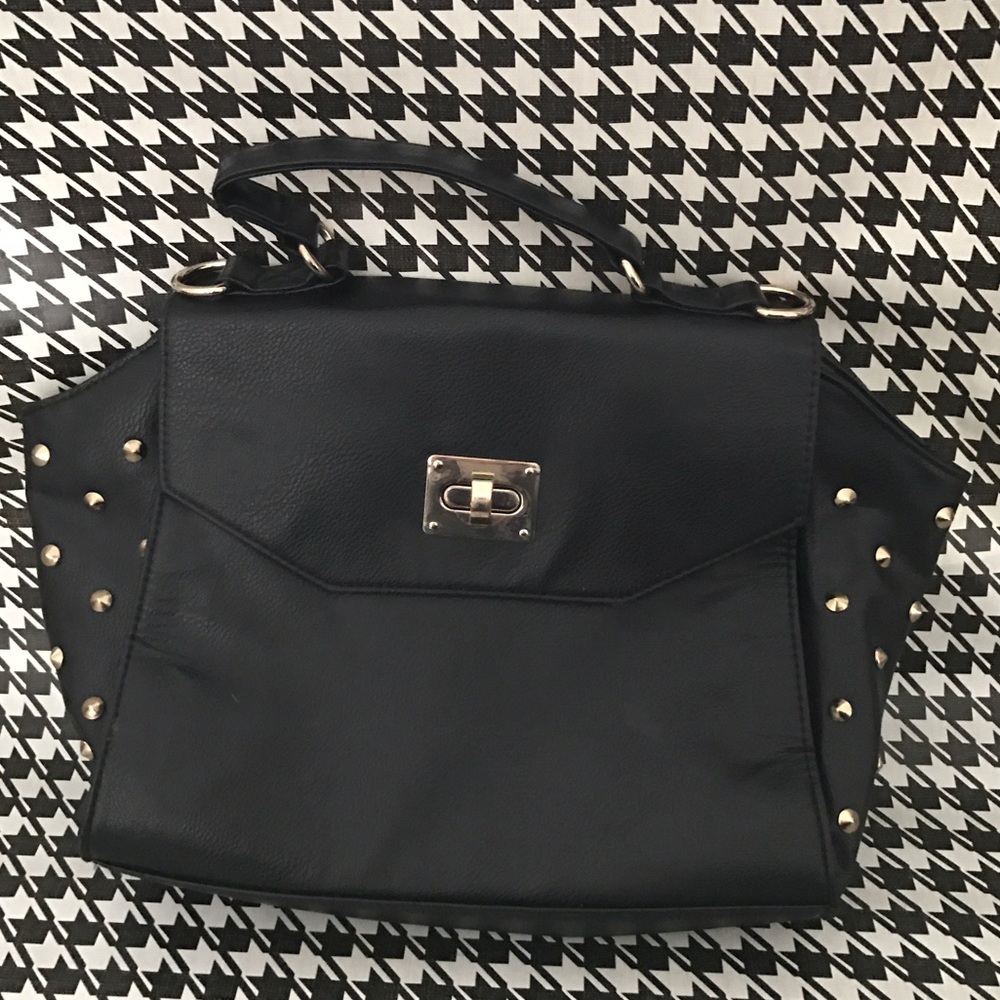 Black and gold studded handbag