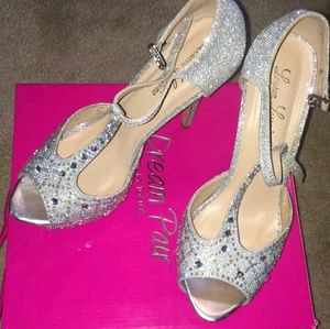 Sparkly Silver 4 in. Heels.