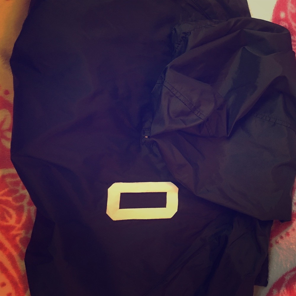 A black Obey windbreaker