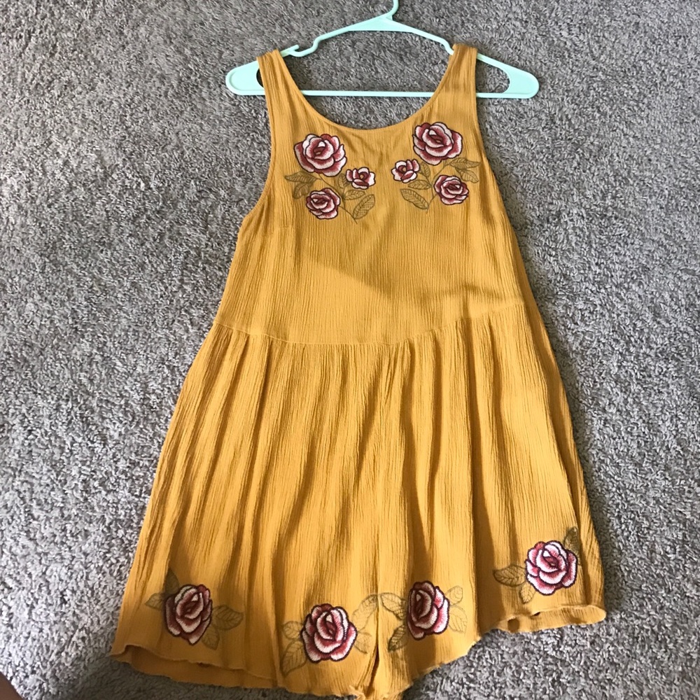 Retro looking, mustard yellow romper