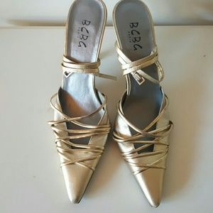 BCBG gold metallic ankle strap stilettos
