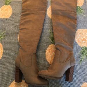 Thigh high tan heeled boots