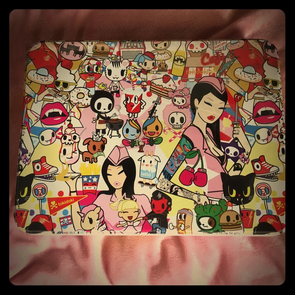 Tokidoki makeup box. Comes from a cat & dog house
