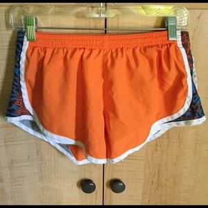 Orange running shorts