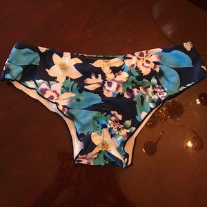 Floral and navy blue swimsuits bottoms