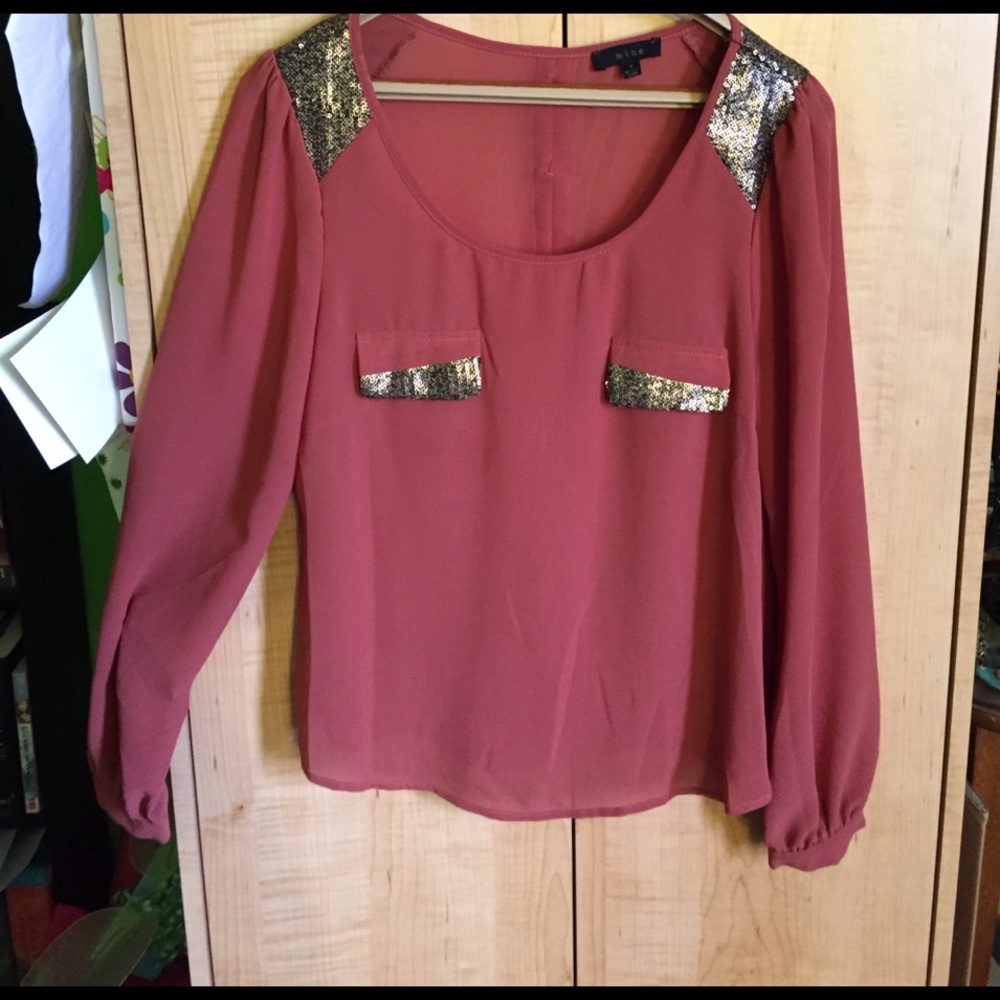 Burnt orange long sleeve top with sequence