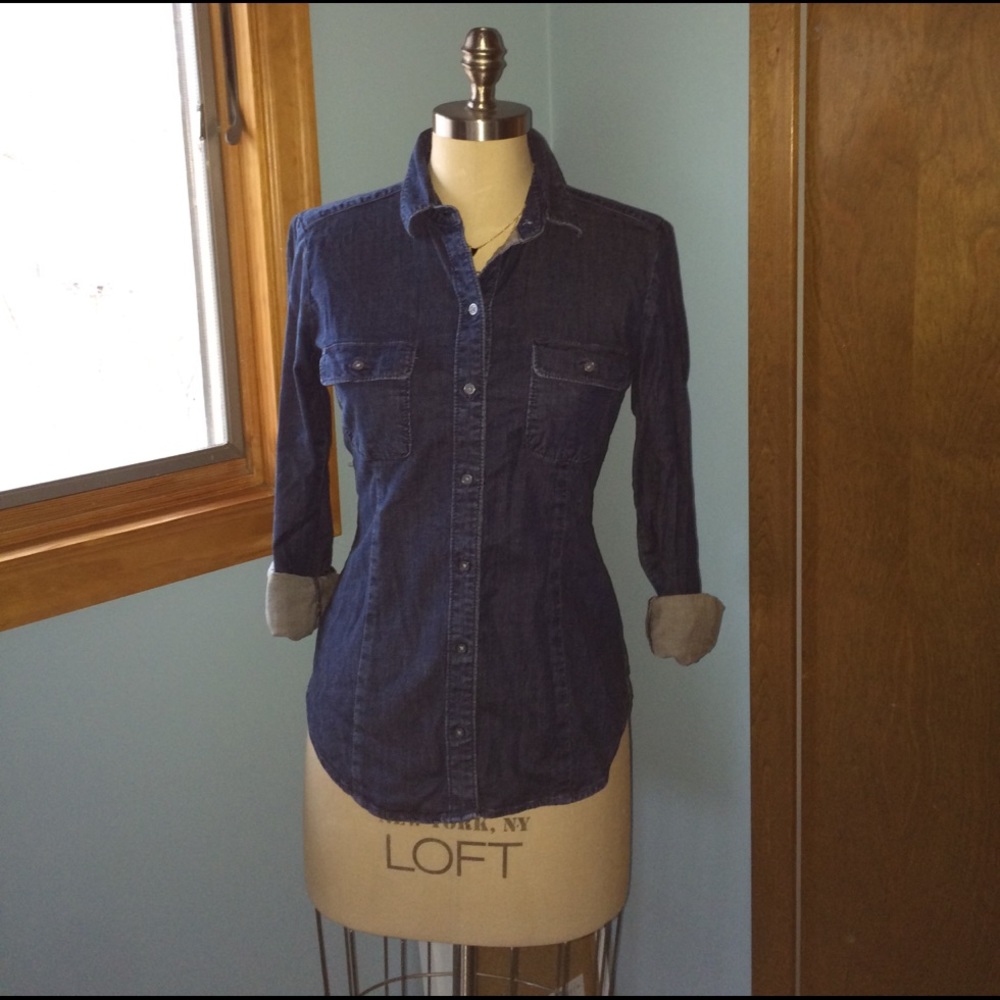 Denim shirt.