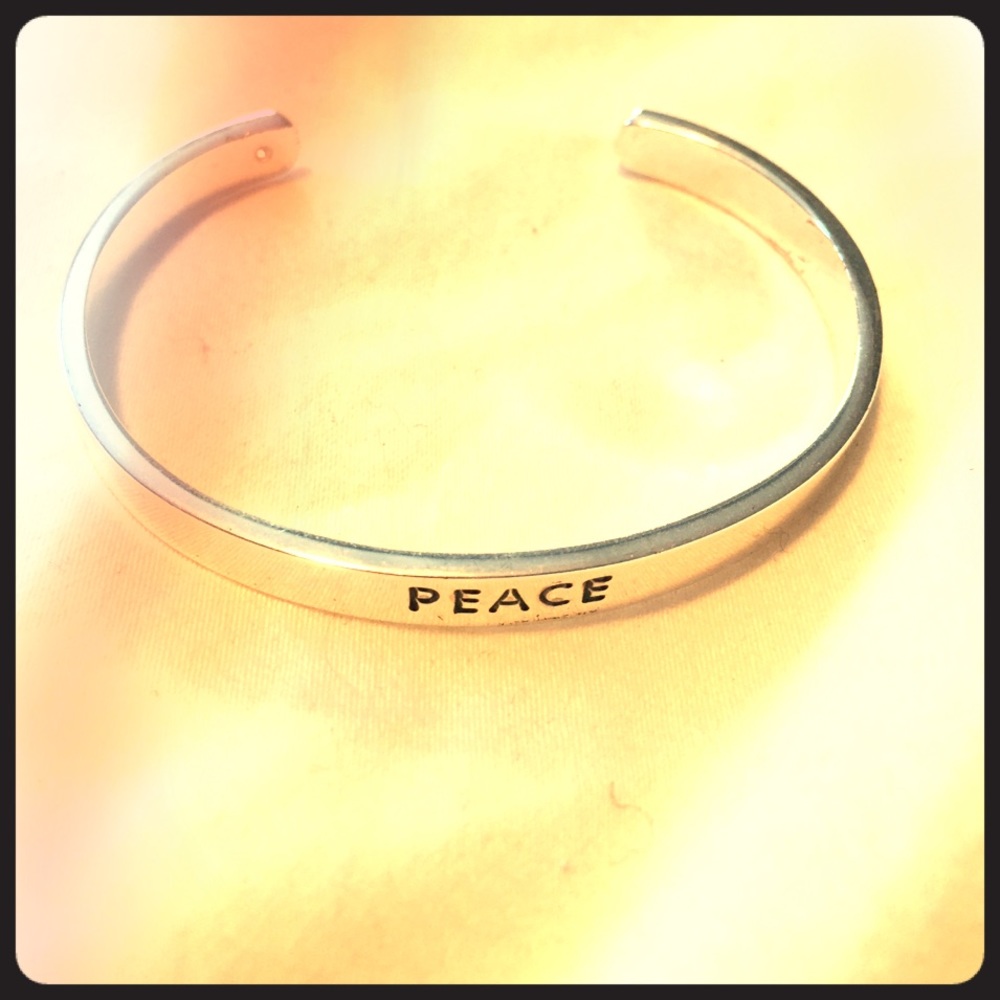 Peace bracelet, never worn!
