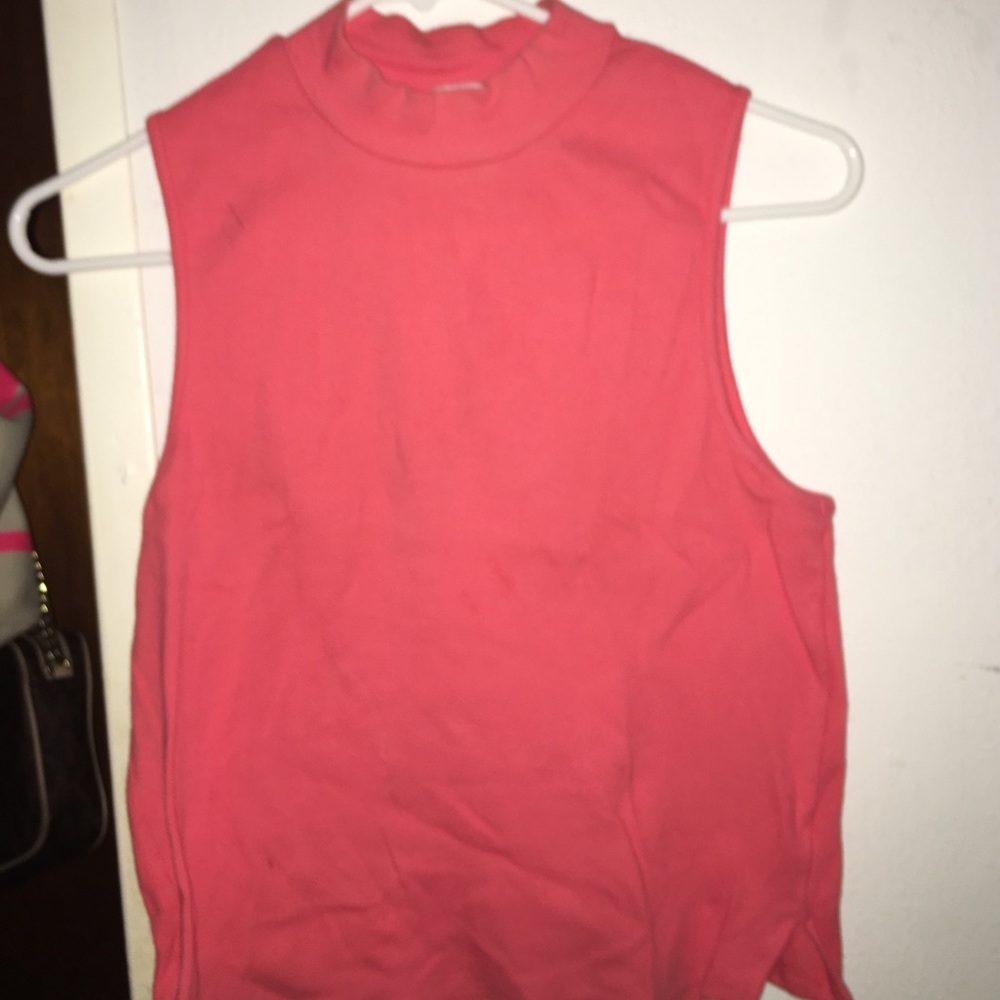 Coral sleeveless turtle neck