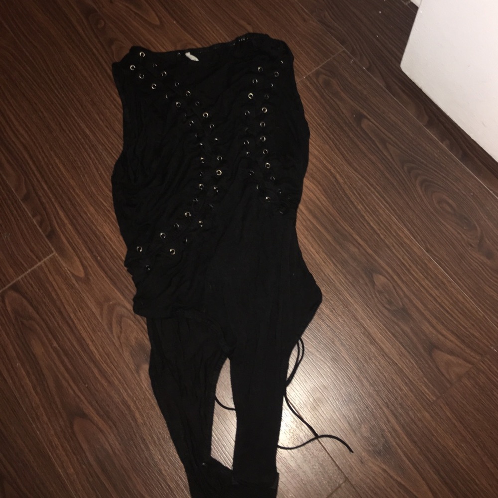 Laced one piece body suit