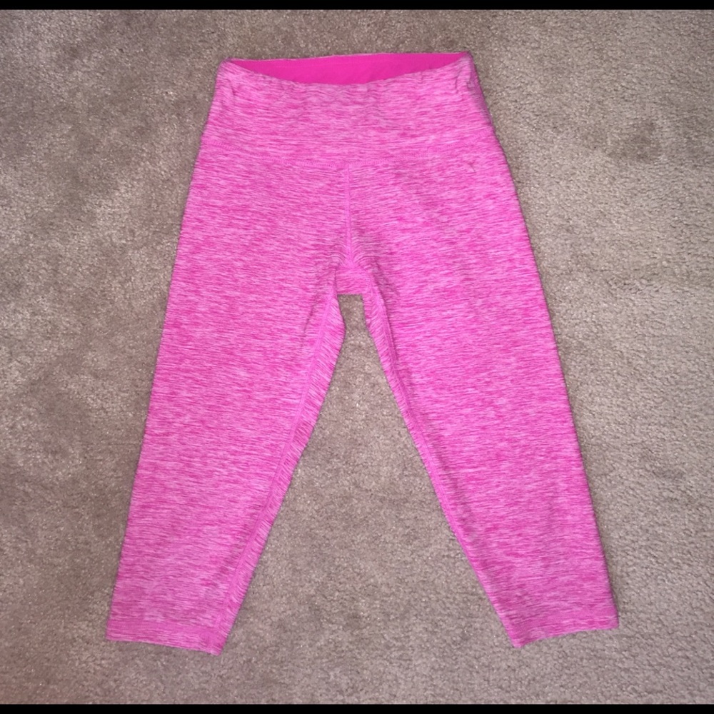 Woman's pink and white capris pants