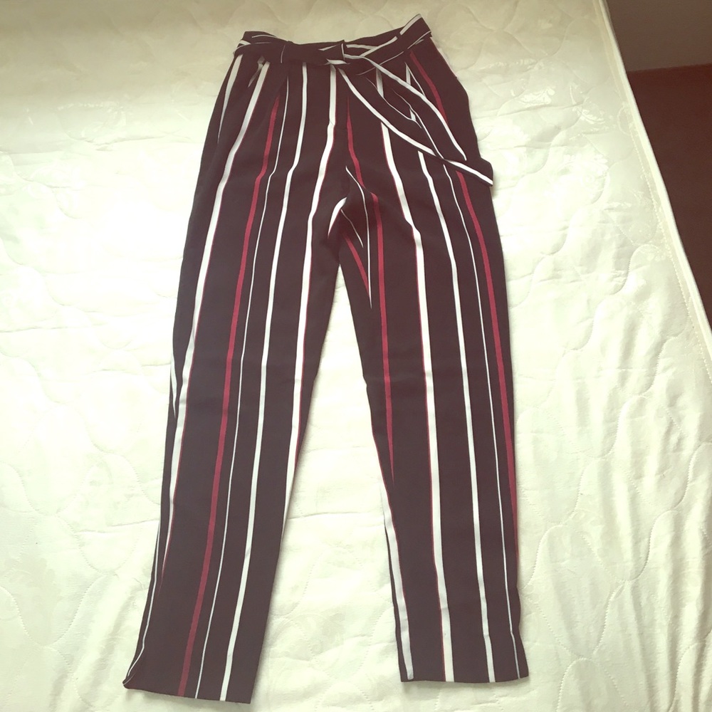 Black white red striped trousers