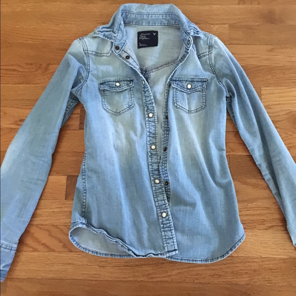Denim shirt.