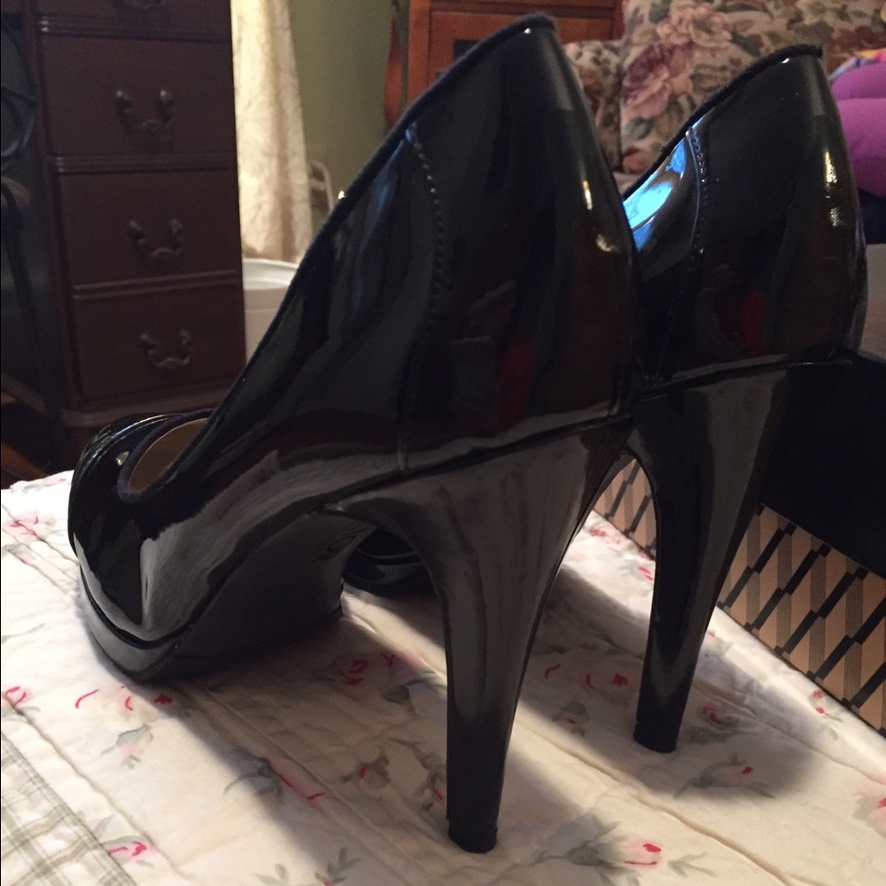 Black patent leather stilettos by Victor Alfaro