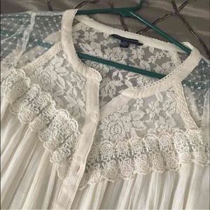 AE Cream Blouse. Size is medium