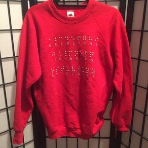Red Sweatshirt with Braille Alphabet