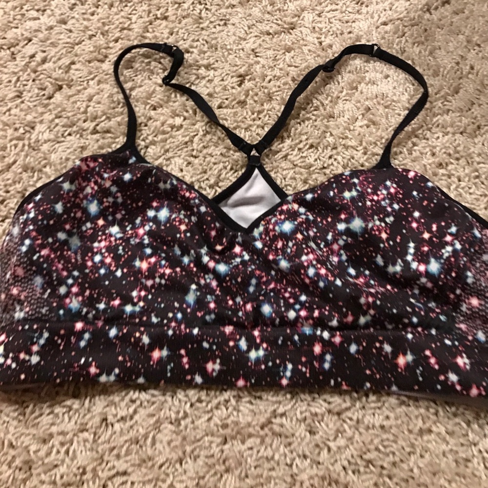 Pink galaxy sports bra