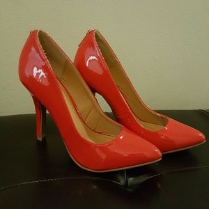 EUC Red patent heels with gold zipper